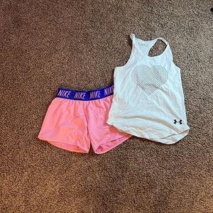 Lot of girls workout gear! Super cute Nike shorts and under armor tank!
